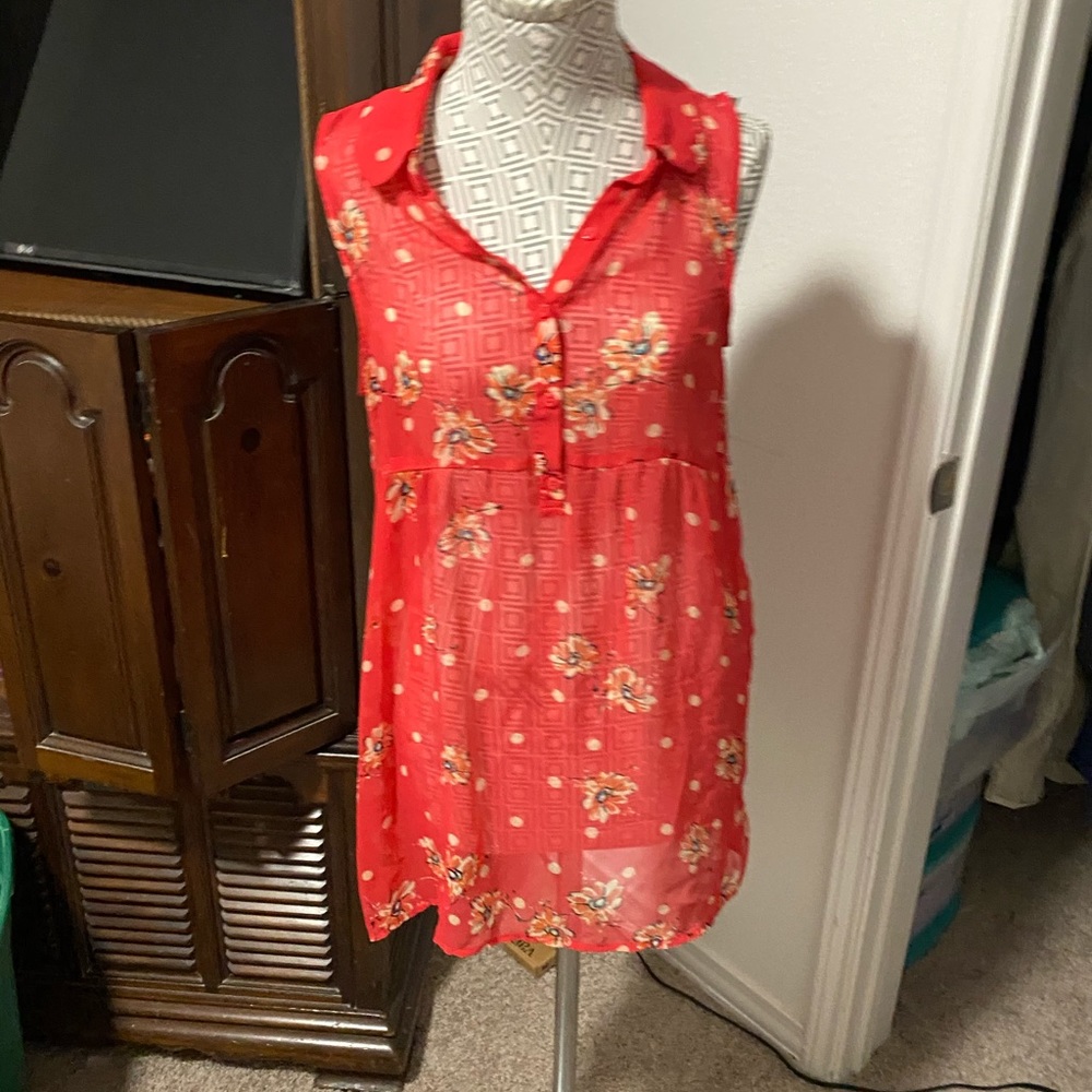 Sheer sleeveless blouse